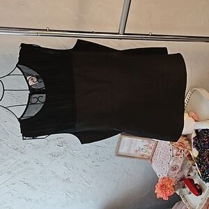 Cabi black bustier peplum snakeskin top. Size 8.